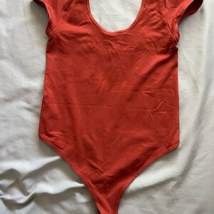 Womens Red One Piece bodysuit